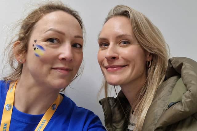 Lauar pictured volunteering at Leeds Rhinos on Friday night with netabll royalty Tamsin Greenway.