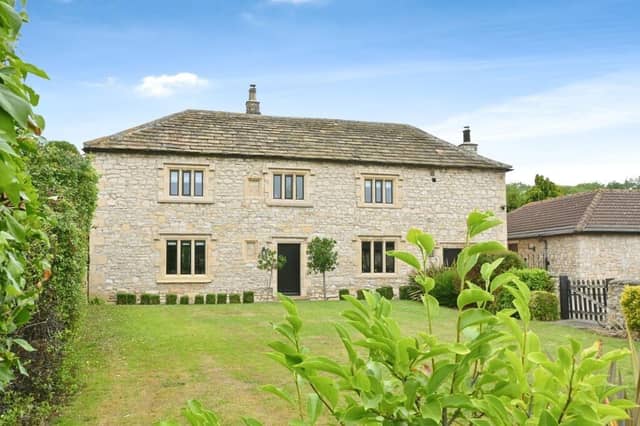 This stone-built, Grade ll-listed farmhouse is for sale at £800,000.
