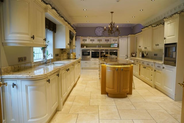 The beautiful kitchen is light and spacious, providing the perfect place to cook up a feast.