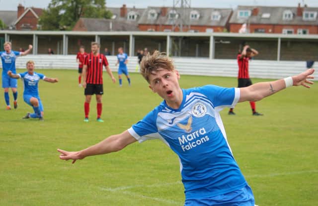 Adam Baskerville celebrates scoring the winner for Armthorpe Welfare at Shirebrook Town. Pictures by Steve Pennock