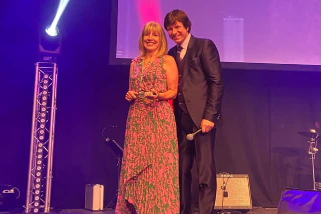 Pam McConnell winning the Lifetime Achievement Award and Steve Walls, Host of the CYP Awards