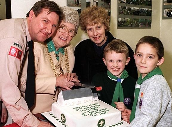 The Mayor of Doncaster visited the 67th Doncaster Scout Group, Sprotbrough, to cut a cake marking 10 years since they moved into The Barn. Pictured at the cutting ceremony are from the left, Ron Dawson, Assistant Cub Scout Leader, 677th Falcons, Councillor Dorothy Layton, Mayor of Doncaster, June Stevens, past leader and maker of the cake, George Fellows, Cub, and Mathew Leigh, Beaver, January 1997