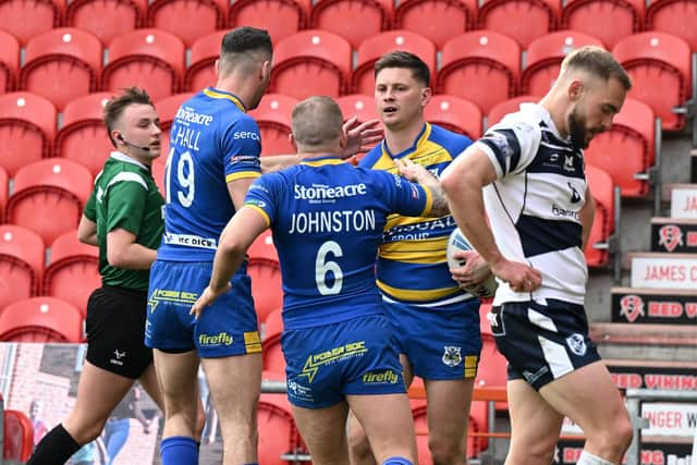 The Dons celebate Josh Guzdek's try. Picture: Howard Roe/AHPIX.com