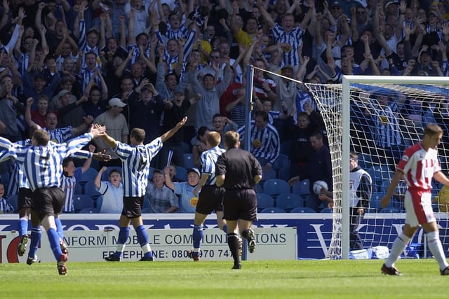 Shefki Kuqi celebrates after scoring the second goal during the derby against United at Hillsborough in September 2002.