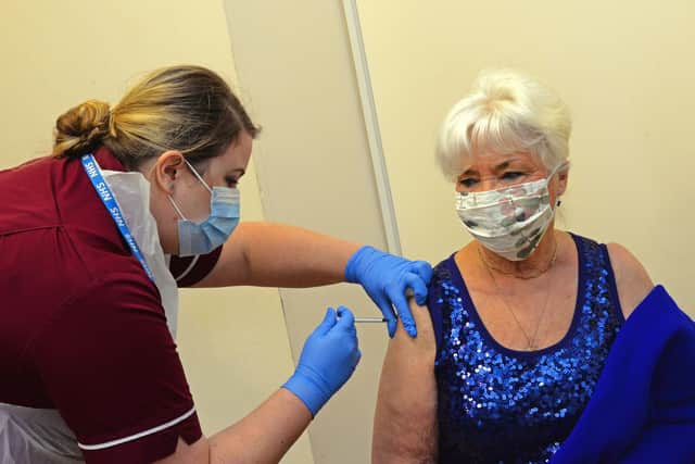 Jeannette Adams, of Bessacarr, is the second patient to recieve the Covid-19 Vaccination in Doncaster. Picture: NDFP-15-12-20-CovidVaccine 5-NMSY