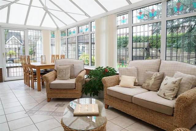 The beautiful conservatory is light and airy and features sliding doors which offer an easy flow to the outdoor area.
