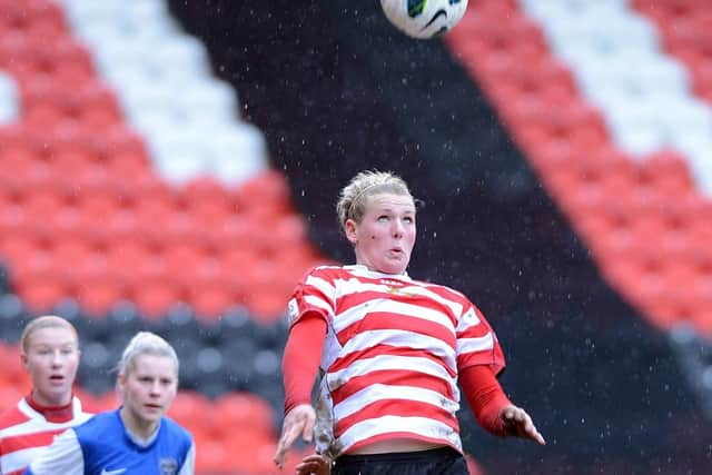 Millie Bright wins a header during a FA Women's Cup fifth round clash against Bristol Academy WFC in 2013.