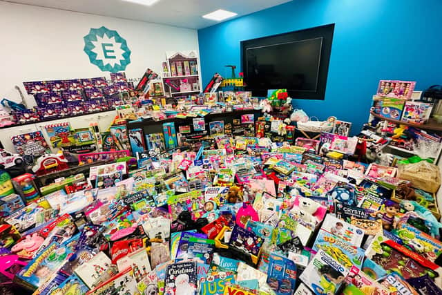 Dozens of toys were collected by the firm to distribute to children across Doncaster.