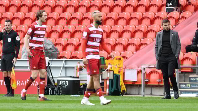 A dejected Andy Butler looks on
