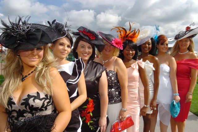 Ladies Day at the St Leger Festival 2010. L-R are Stevi Tidmarsh, 21, of Hatfield, Leah Jaine, 19, of Stainforth, Sally Holden, of Hatfield Woodhouse, Julie Tidmarsh, of Hatfield, Denise Chakanesta, 28, of Intake, Faith Camm, of Edenthorpe, Becky Hunt, 23, of Edlington, and Tina Griffin, of Edenthorpe. Picture: Liz Mockler D7052LM