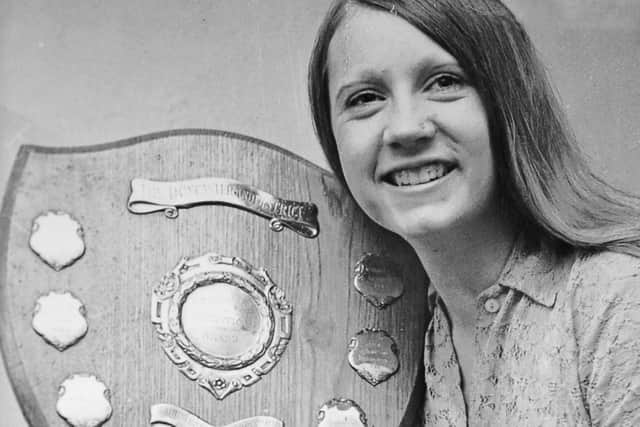 Elaine Green, pictured at 17 years old holding the Doncaster and District Apprenticeship of Hairdressing award she won. Picture: NDFP-15-12-20-BarberRetiring 1-NMSY