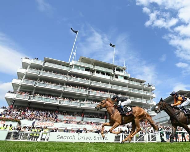 Action from Epsom Downs Racecourse. Photo: GLYN KIRK/AFP via Getty Images