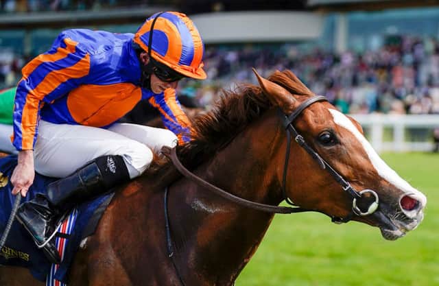 Ryan Moore aboard Love at Royal Ascot. Photo by Alan Crowhurst/Getty Images