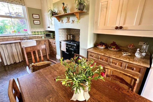 The open plan living and dining kitchen is full of style and character.