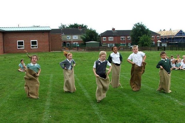 Thorne Green Top School, key stage 1 pupils sports day, from left, Farrah Smith, Ellie Greensmith, Luke McAllister, Laina Hamilton, Kieran Moore and Paul Tonge taking part in the sack race (2004)