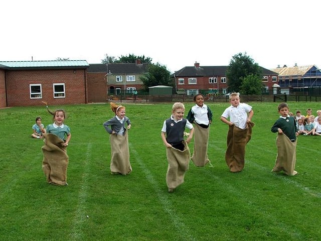 Thorne Green Top School, key stage 1 pupils sports day, from left, Farrah Smith, Ellie Greensmith, Luke McAllister, Laina Hamilton, Kieran Moore and Paul Tonge taking part in the sack race (2004)
