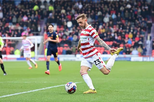 Charlie Lakin in action for Doncaster Rovers.