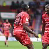 Joe Dodoo celebrates his goal against Cheltenham with Joseph Olowu. Photo: Howard Roe/AHPIX LTD