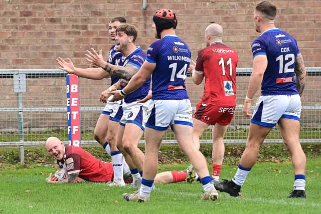 Tom Halliday scores for the Dons. Picture: Howard Roe/AHPIX.com