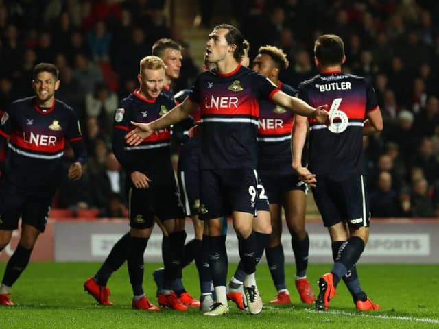 John Marquis celebrates scoring for Rovers in the 2019 League One play-off semi-final second leg at Charlton. Photo by Bryn Lennon/Getty Images