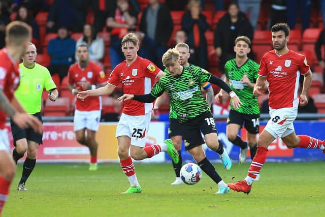 Doncaster Rovers' Max Woltman breaks from midfield against Crewe Alexandra.