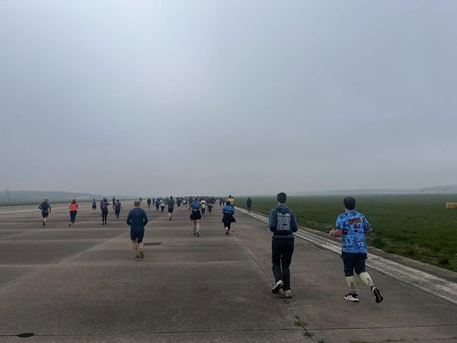 Runners ran along the runway at DSA