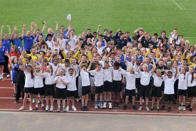 All students and assistants at an interschool sports day held by Danum Academy at Keepmoat Athletic Track (July 2012)