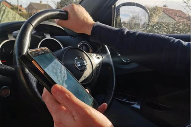 Police officers in South Yorkshire are cracking down on motorists using mobile phones while they are driving