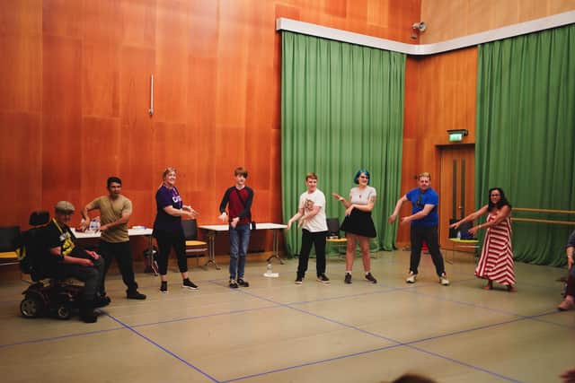 Cast in rehearsal for The Magic of Wild Heather.
