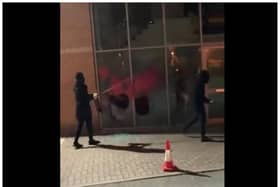 Footage showed people dressed in black attacking the offices of Thales in Doncaster.