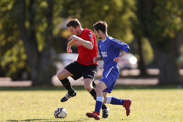 Wymering's Dan Audin, left, v FC Strawberry. Picture: Chris Moorhouse