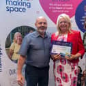 Patricia (centre) receiving her Making Space award last year.