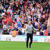 Doncaster's manager Gary McSheffrey celebrates Keiran Agard's injury-time winner.