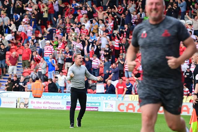 Doncaster's manager Gary McSheffrey celebrates Keiran Agard's injury-time winner.