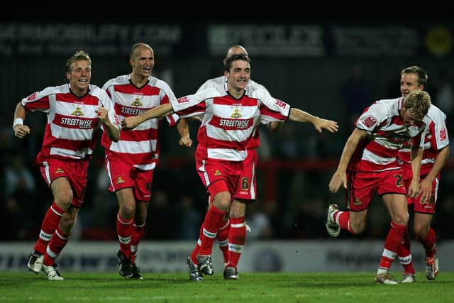 Paul Heffernan (centre) leads the Rovers celebrations after their Carling Cup victory over Manchester City in 2005. Photo: Michael Steele/Getty Images