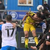 Doncaster Rovers pair Louis Jones and Joseph Olowu go up for a header in the final minute at Barrow.
