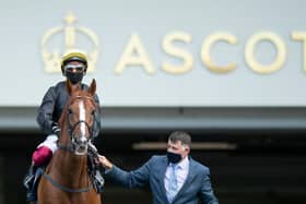 Stradivarius and Frankie Dettori are led on to the course at Ascot last year. Photo by Edward Whitaker/Pool via Getty Images