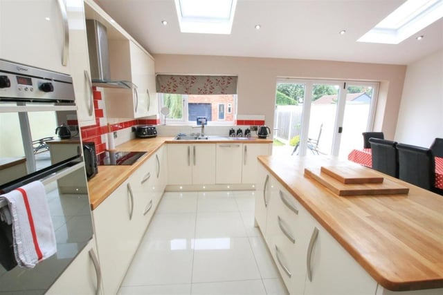 The well equipped kitchen includes appliances within its sale.