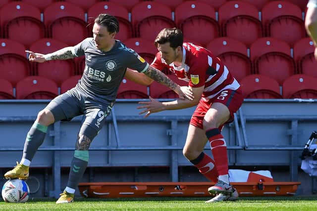 Joe Wright looks to contain Fleetwood goalscorer Barrie McKay. Picture: Andrew Roe/AHPIX