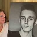 Lisa Theobald with a picture of her son Ryan.
