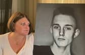 Lisa Theobald with a picture of her son Ryan.