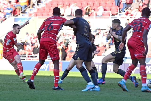 Tommy Rowe has a shot on goal. Picture: Andrew Roe/AHPIX LTD