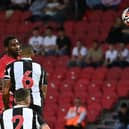Omar Bogle watches his header drop into the net against Newcastle United. Picture: Howard Roe/AHPIX
