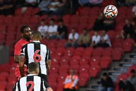 Omar Bogle watches his header drop into the net against Newcastle United. Picture: Howard Roe/AHPIX