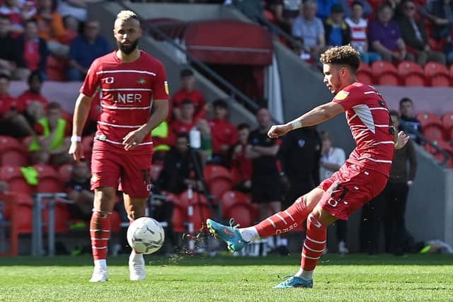 John Bostock watches on as Josh Martin goes close with a freekick. Picture: Andrew Roe/AHPIX LTD