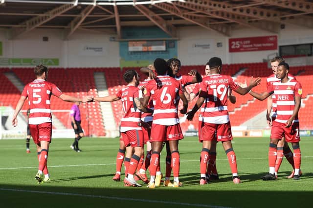 Rovers celebrate Madger Gomes' goal against MK Dons