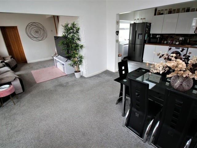 Looking across the open plan ground floor of the property.