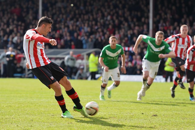 Marcello Trotta of Brentford misses a last minute penalty that would have given his team automatic promotion. You know what happened next (photo by Mike Hewitt/Getty Images).