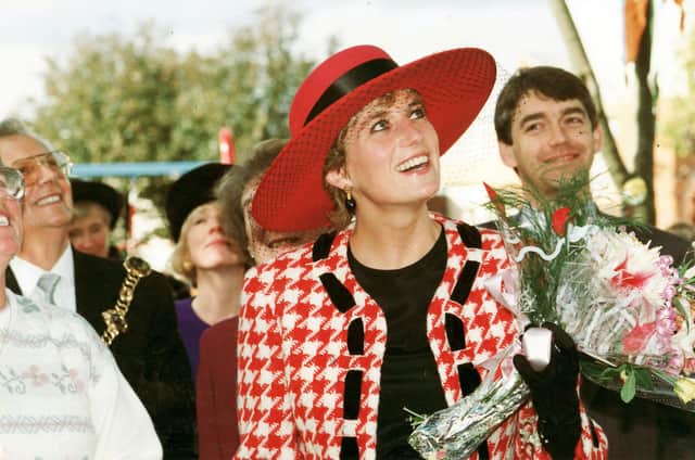The Princess of Wales looks up at residents at Buckingham Green, Buckland, Portsmouth as their roar welcomes her, as she tours parts of Portsmouth after receiving the Honorary Freedom of the City on 16th October 1992
