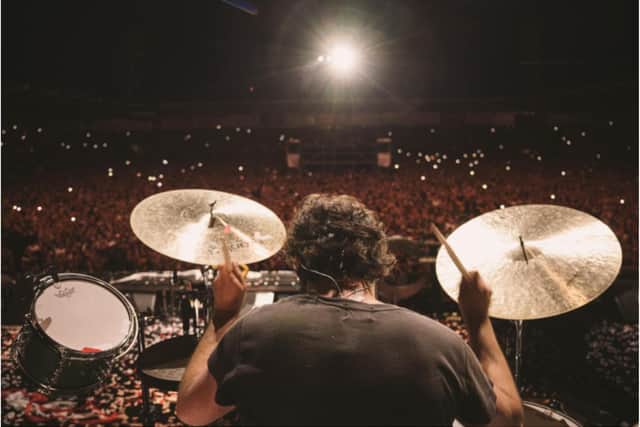 Drummer Ronnie Vannucci Jr with the Eco Power Stadium spread out before him. (Photo: The Killers).